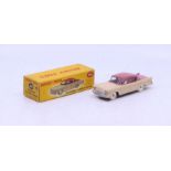 Dinky: A boxed Dinky Toys, Packard Clipper Sedan, Reference No. 180, two-tone cerise and beige.