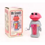 Marx Toys: A boxed Louis Marx & Co., Mr Smash, Clockwork Walking Smash Martian, Ref. No. 5468.