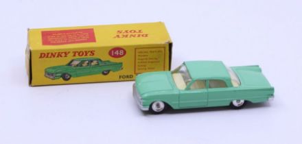 Dinky: A boxed Dinky Toys, Ford Fairline, Reference No. 148, light green body, off-white interior.