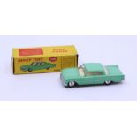 Dinky: A boxed Dinky Toys, Ford Fairline, Reference No. 148, light green body, off-white interior.