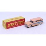 Dinky: A boxed Dinky Toys, Nash Rambler with Windows, Reference No. 173, salmon pink body with