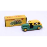 Dinky: A boxed Dinky Toys, Austin Taxi, Reference No. 254, green and yellow body. Original box,