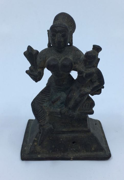 A 19th century (or earlier) Indian bronze figure of a deity with consort, height 7.8cm