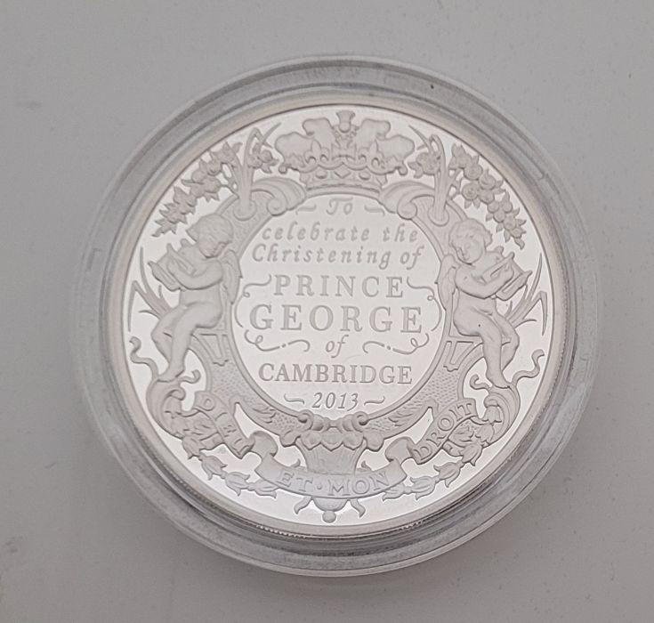 An Elizabeth II 2013 UK Ten pounds (5 ounce) silver proof Christening of Prince George commemorative
