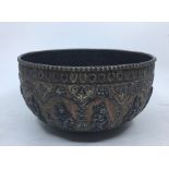 An Indian mixed metal bowl, late 19th/early 20th century, the exterior decorated with white metal