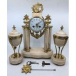 An early 20th century French marble mantle clock and garniture with enameled dial and ormolu mount