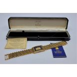 A Brooks & Bentley "The gold ingot watch" gold plated gentleman's quartz bracelet watch, having 25mm