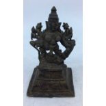 A 19th century Indian bronze figure of an eight armed Durga, height 11.5cm