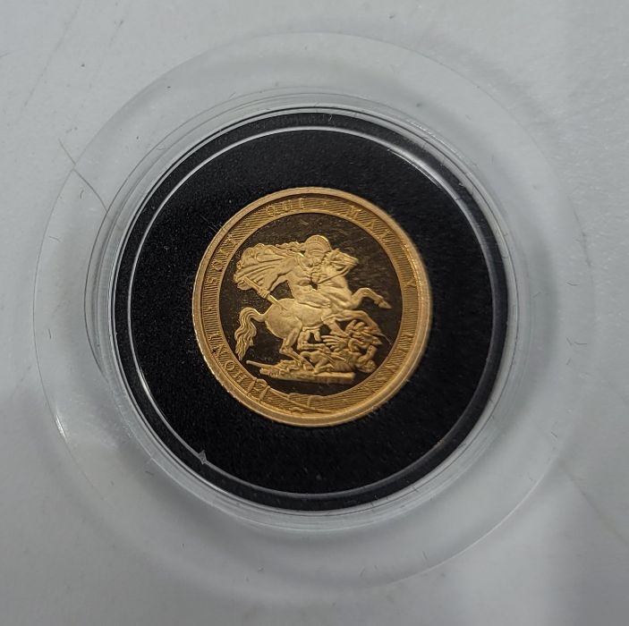 An Elizabeth II 2017 quarter-sovereign gold coin, obverse portrait Jody Clark, rev, St.George - Image 2 of 3