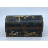 A 20th century Indian wooden casket, painted with lions, leopards and owls within gilt borders, H: