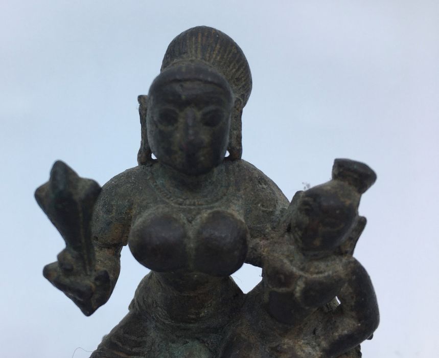 A 19th century (or earlier) Indian bronze figure of a deity with consort, height 7.8cm - Image 2 of 5