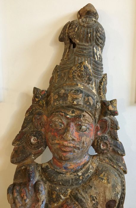 A large Indian carved wooden architectural block depicting a deity, late 19th/early 20th century, - Image 2 of 3