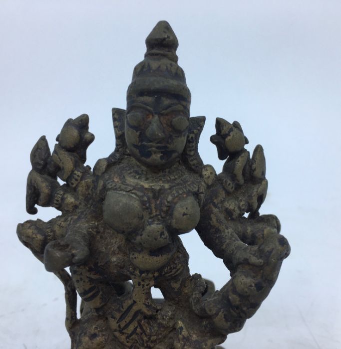 A 19th century Indian bronze figure of an eight armed Durga, height 11.5cm - Image 2 of 5