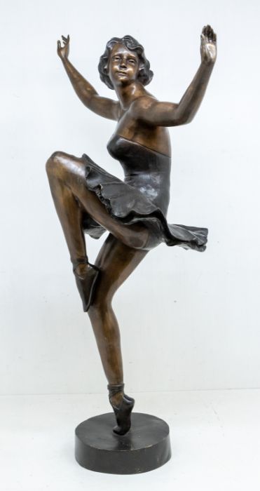 After Chiparus, a large 1950s cast bronze of an Art Deco Ballerina, bearing signature to base,