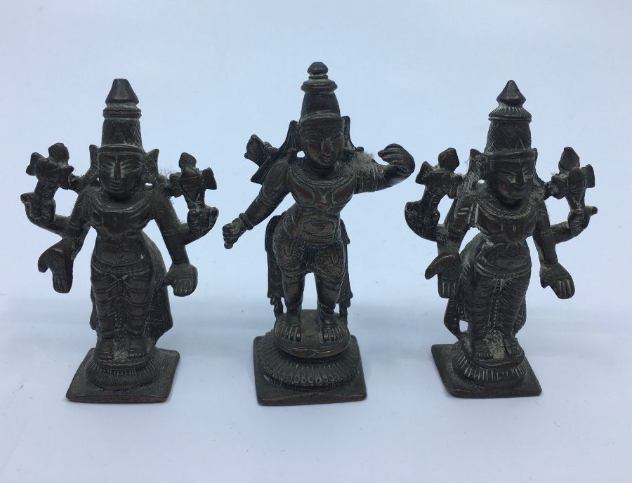 A 19th century Indian bronze group of three deities, to associated base, height 17cm. - Image 5 of 8