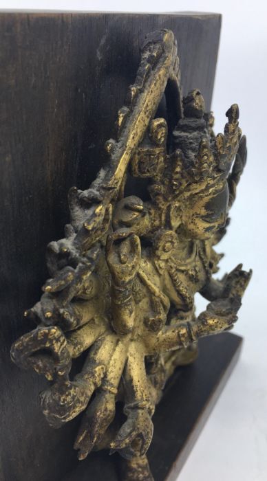 A Sino-Tibetan gilt bronze figure of eighteen armed Durga, late 19th/early 20th century, probably - Image 6 of 6