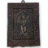 A 20th century Indian cupro-bronze plaquette, with deity to centre, 13.5cm x 9.9cm.