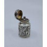 A silver mounted scent bottle, by Sampson Mordan & Co, London 1890, repousse flowers and 'C'