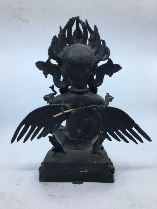 A 20th century Sino-Tibetan bronze figure of standing Garuda, height 35cm. - Image 4 of 5