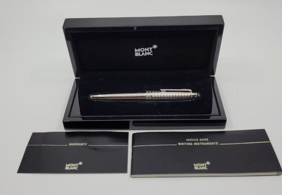 A Mont Blanc Meisterstuck silver plated fountain pen, with 14k nib engraved "4810" , in presentation