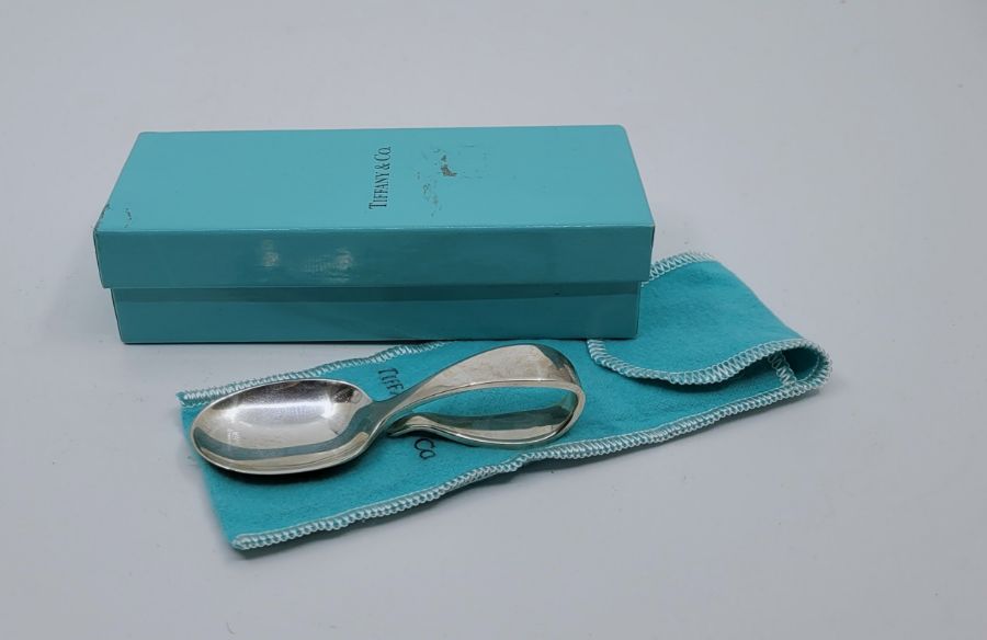 A Tiffany & Co sterling silver "Loop Baby Spoon", in pouch and box, length 9cm.