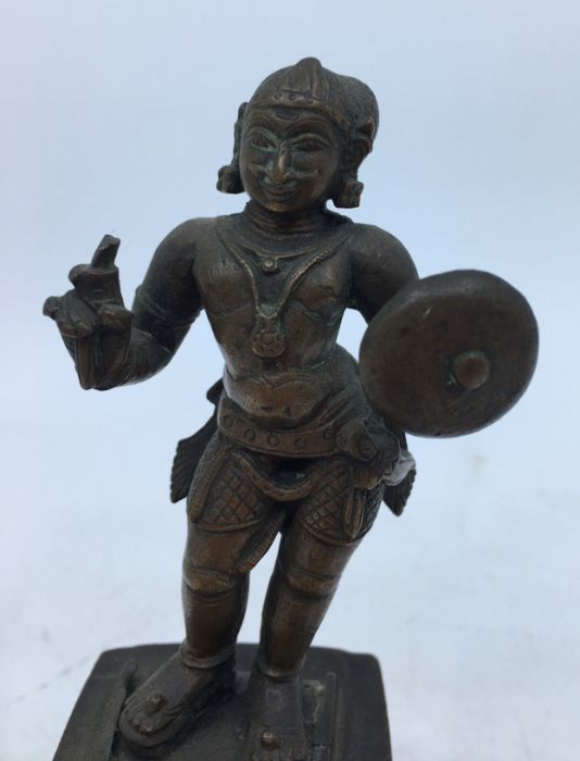 A 20th century Indian bronze figure of a standing figure, height 14cm. - Image 2 of 5