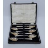 A set of six silver fruit spoons, by Cooper Brothers & Sons Ltd, Sheffield 1955, boxed. (silver