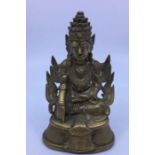 A Sino-Tibetan bronze figure of a seated deity, possibly Akshobhya, late 19th/early 20th century,