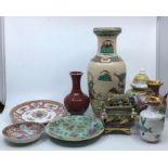 A collection of oriental porcelain to include two Chinese vases (H:31cm), three Chinese plates and