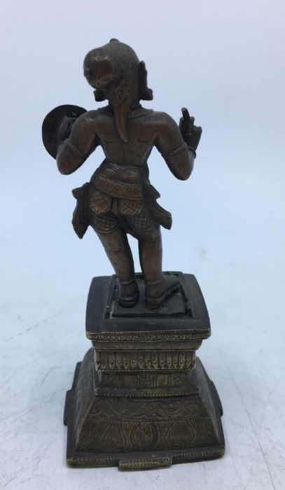 A 20th century Indian bronze figure of a standing figure, height 14cm. - Image 4 of 5
