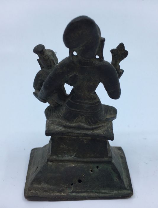 A 19th century (or earlier) Indian bronze figure of a deity with consort, height 7.8cm - Image 4 of 5