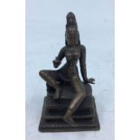 A 19th century (or earlier) Indian bronze figure of seated Saraswati, height 5cm.