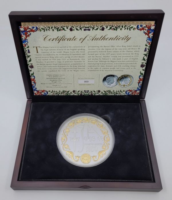 A Guernsey 2015 fifty pounds (10 oz.) "Magna Carta" silver proof coin, with selective 24ct. gold