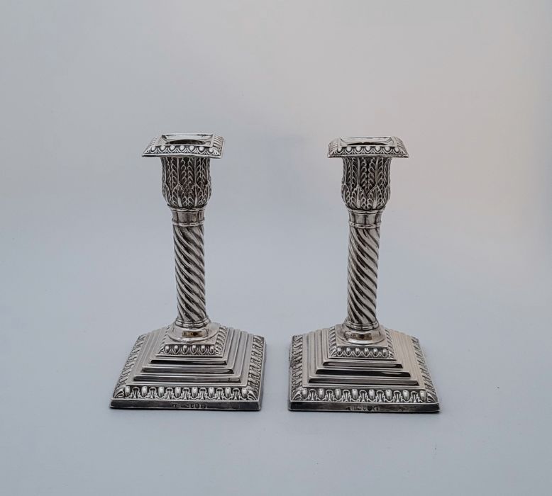 A pair of Victorian silver candlesticks, by Jane Brownett, London 1886,  having egg and dart type