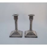 A pair of Victorian silver candlesticks, by Jane Brownett, London 1886,  having egg and dart type