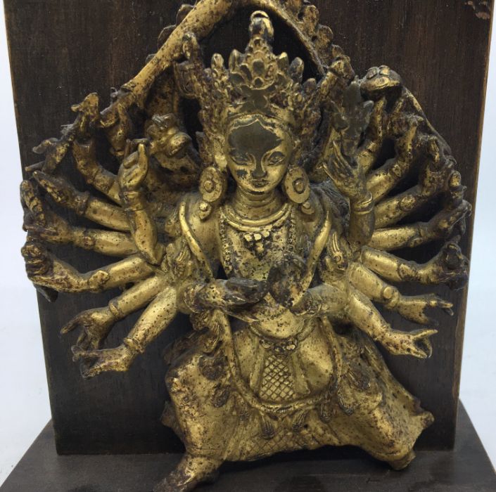 A Sino-Tibetan gilt bronze figure of eighteen armed Durga, late 19th/early 20th century, probably - Image 2 of 6