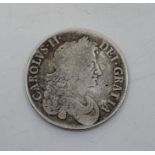 A Charles II 1673 silver crown, obv. third bust, edge V.QVINTO. (F)