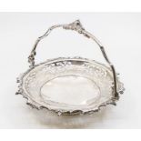 A Victorian silver pierced and engraved hanging basket dish with handle, stylised edged with