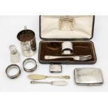 A collection of silver to include a Walker & hall Christening mug inscribed P.K Xmas 1931, along