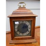 A Smith of Derby three train bracket clock retailed by Goldsmiths, Sanders & Company London, with