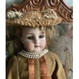 Antique shoulder head doll marked 499 10 bisque with hairline on Forehead  detailed bisque hands(