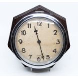 Bayard 8 day wall clock with 7 sided Bakelite case. 8 day spring driven movement 6 1/2" dial with