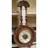 A late Victorian mahogany wall barometer.