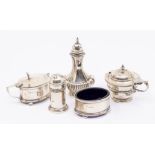 A group of silver to include: a set of three Georgian style condiments (salt, pepper & mustard pot),