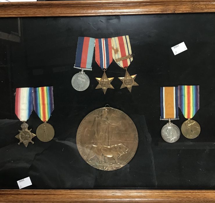 British medal groups in a frame, WW1 medals belonging to two brothers:- 76528 GNR J Gallagher of the