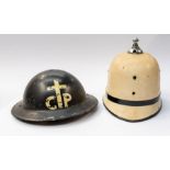 WWII era Home Front Brodie helmet with COP ecclesiastical transfer decal to the front, complete with