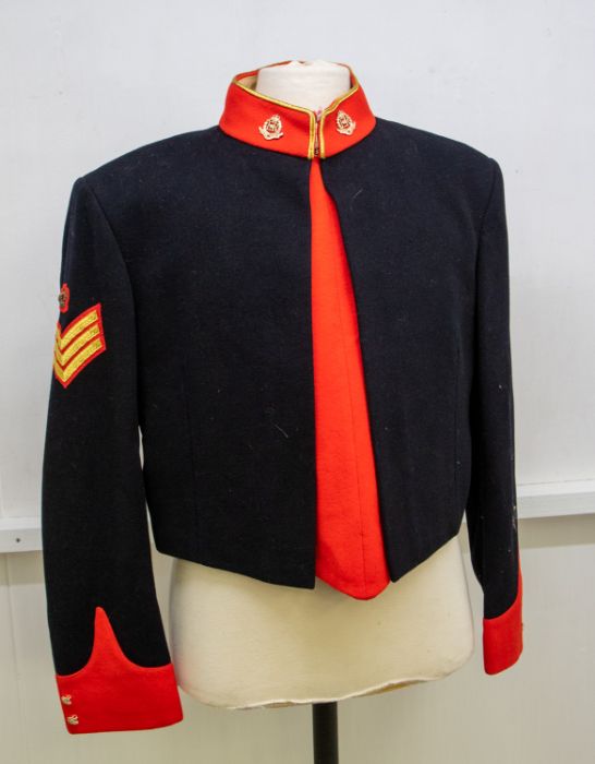 British Army Sergeants mess tunic, black wool with red facings and gold edging to the collar, fitted