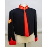 British Army Sergeants mess tunic, black wool with red facings and gold edging to the collar, fitted