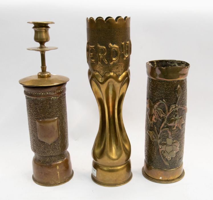 A trio of hand worked WWI era trench art shell cases including a 75mm French example, with hand