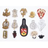 A selection of post WW2 regimental cap / sleeve badges. Various regiments and corps, some with